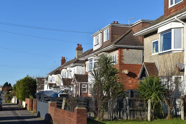 Houses in Mossley Avenue, Branksome — a neighbourhood with many loft conversions, typical of Poole